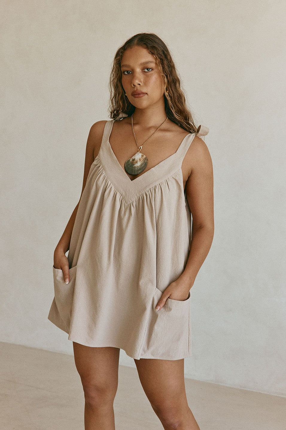 Beige mini dress, front view