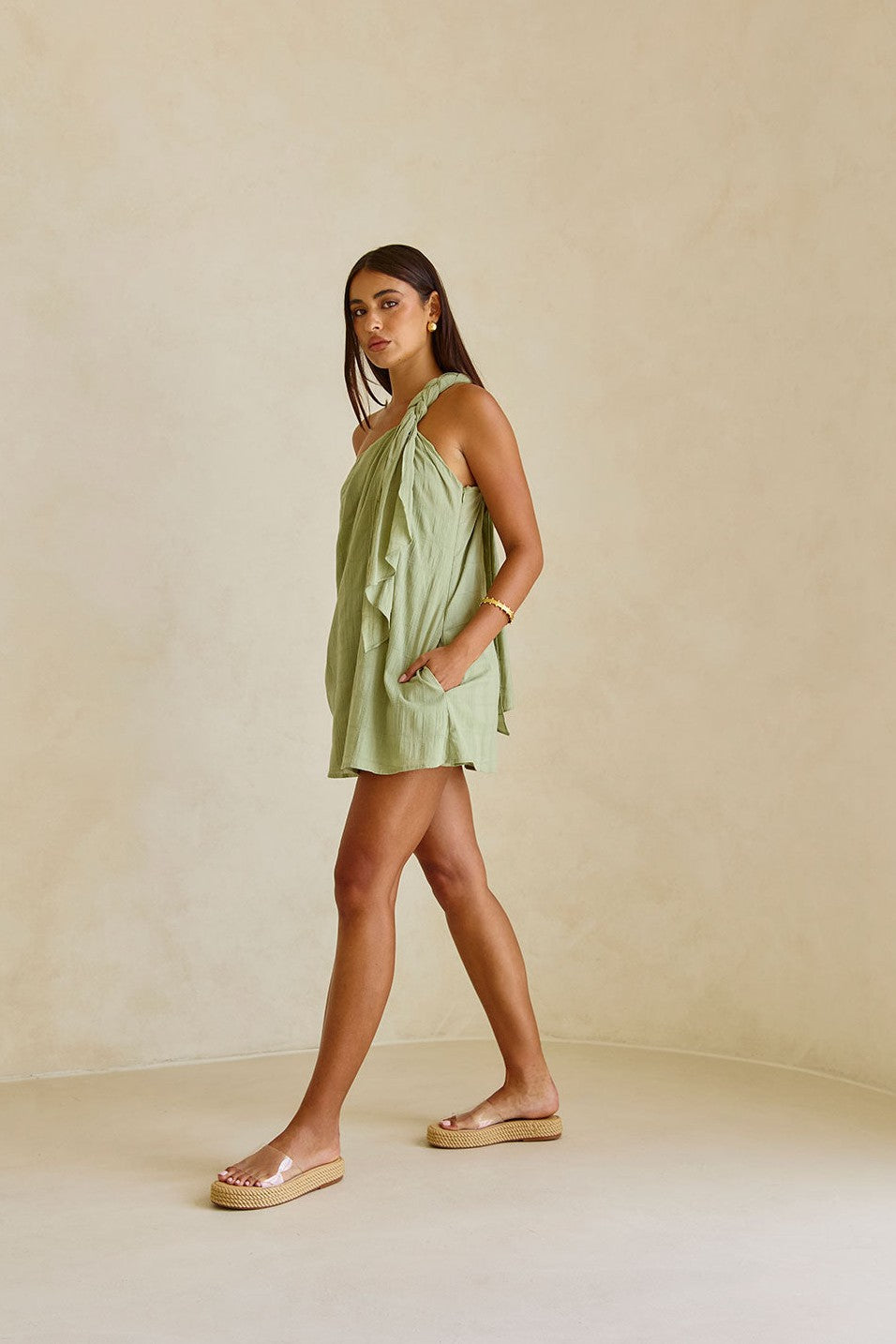 Green mini dress, side view