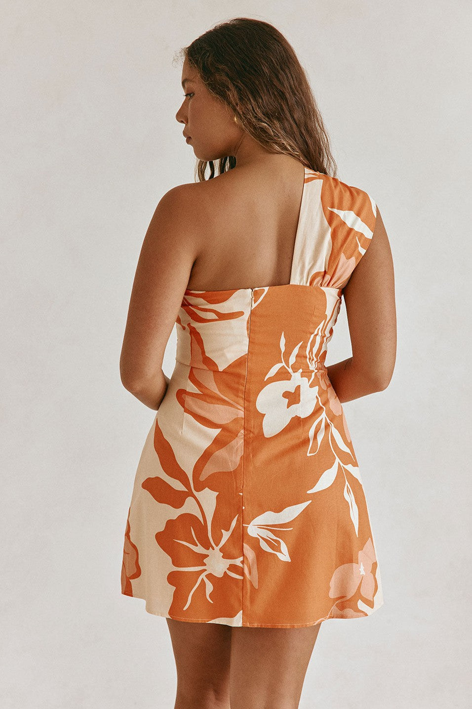 Orange mini dress, side view