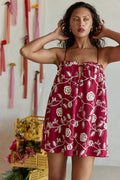 Red mini dress with slim tie straps, front view