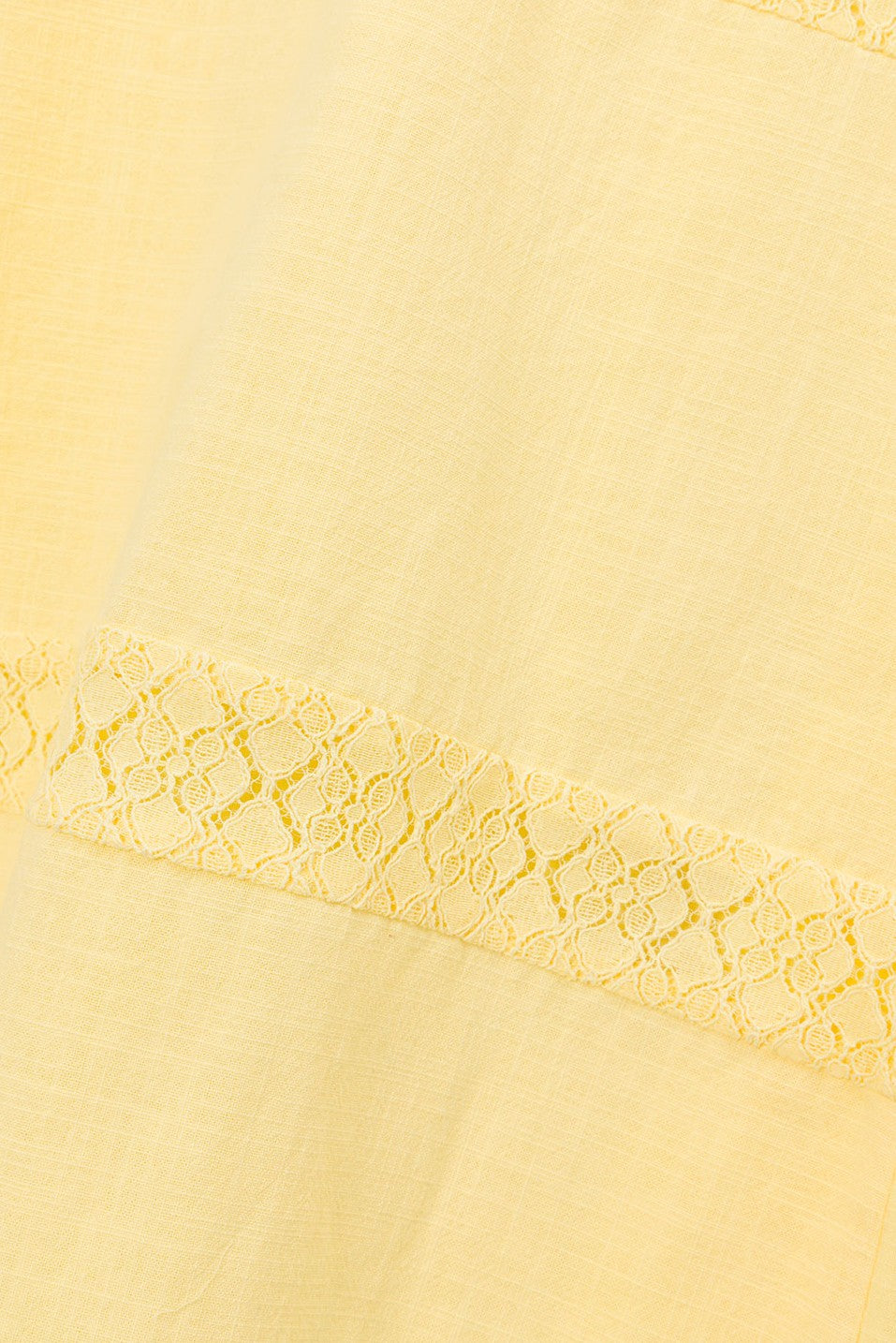 Yellow maxi dress with a round neckline, side view