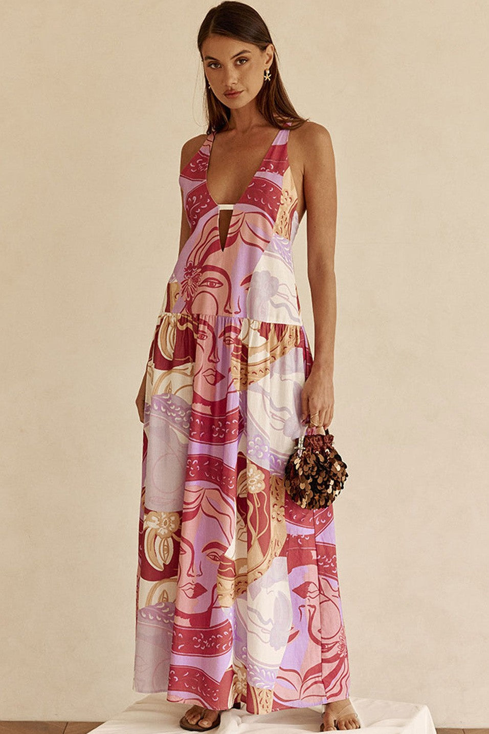 Purple maxi dress with an open back, front view