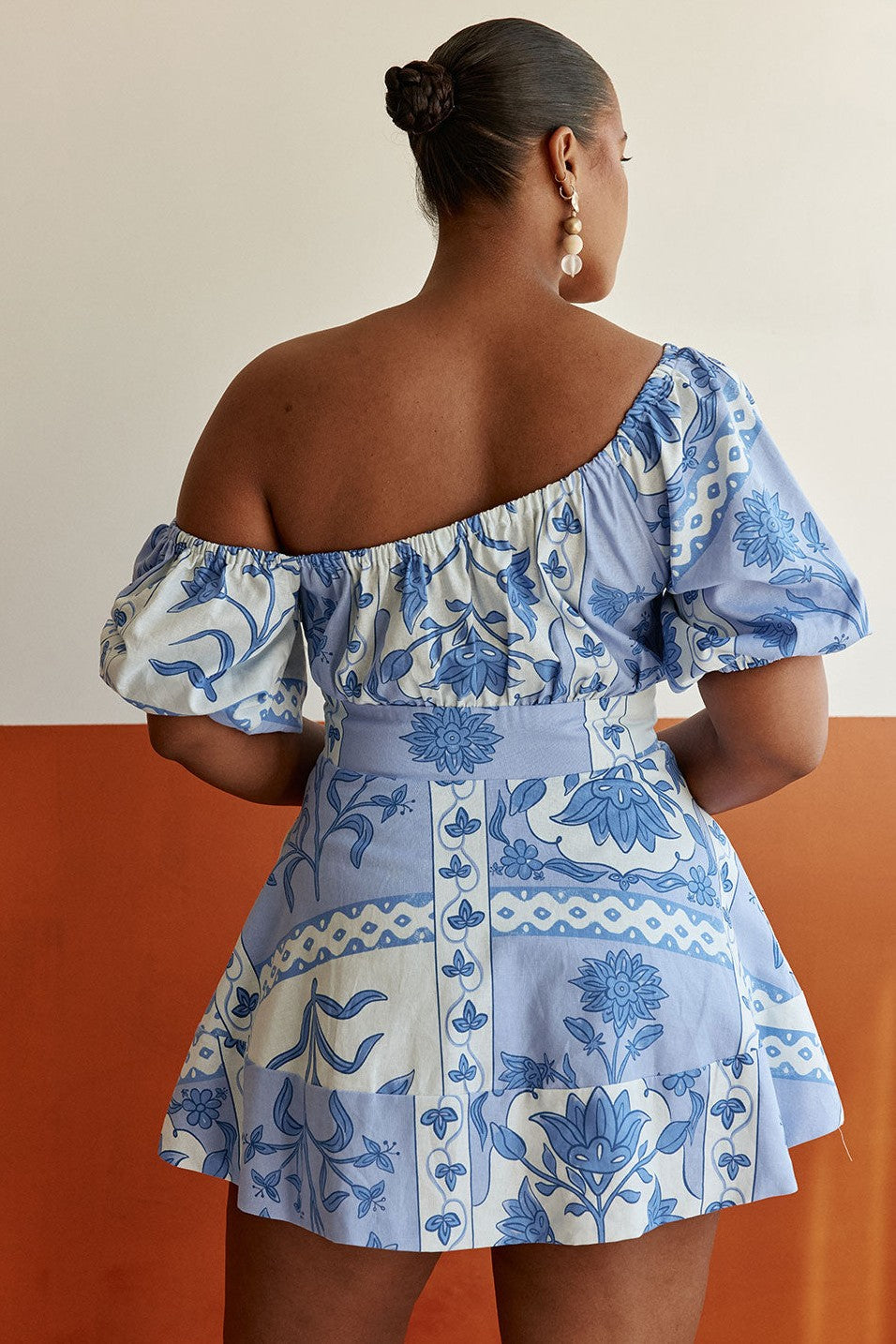 Blue mini dress, back view