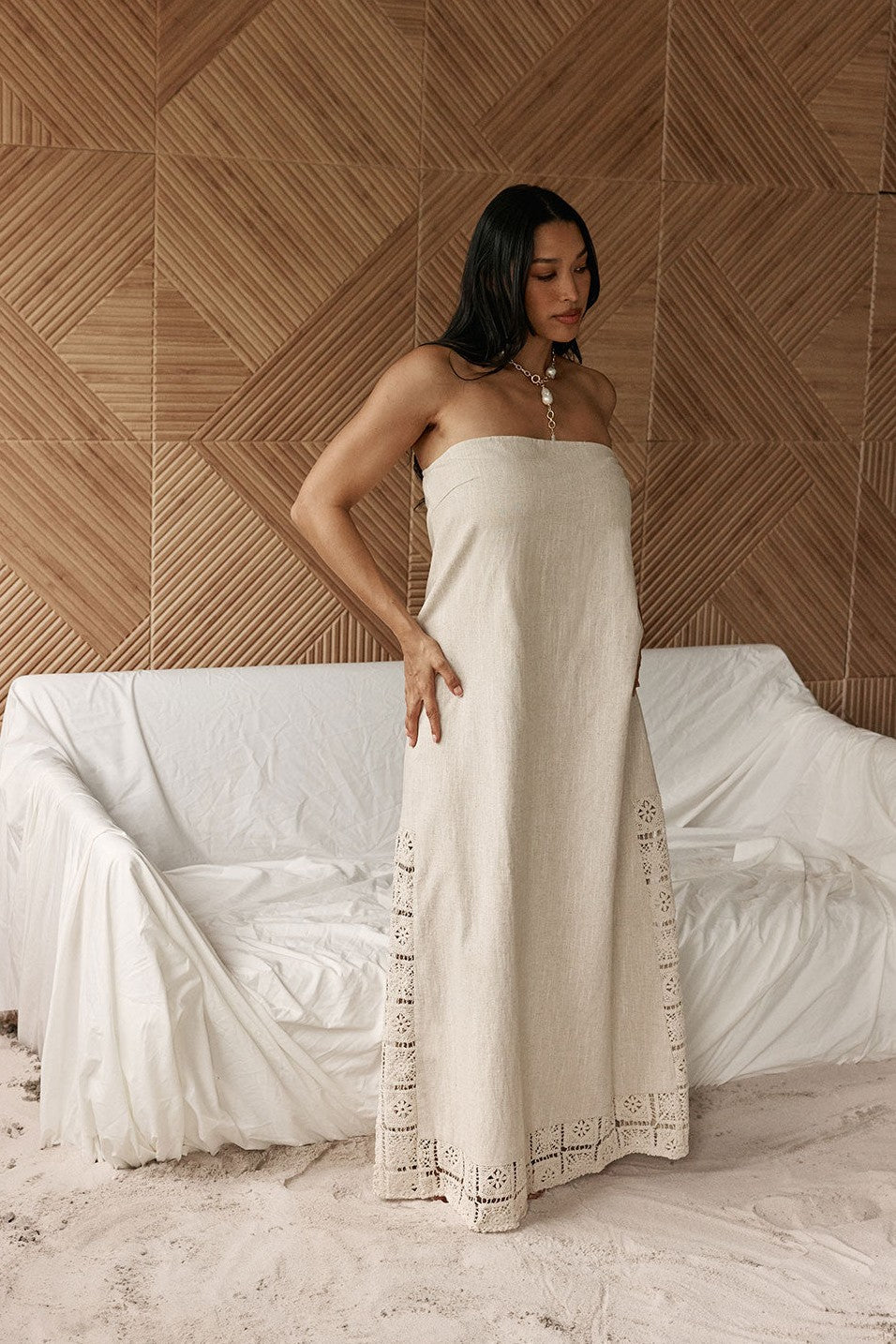 Beige maxi dress with a strapless neckline, back view