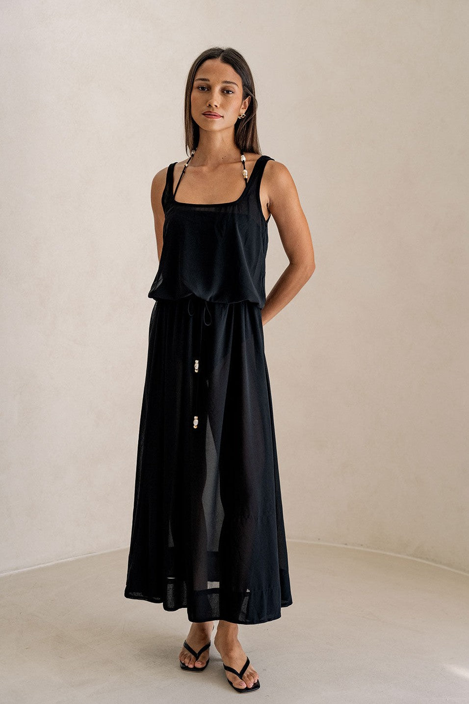 Black maxi dress with a halter neckline, front view