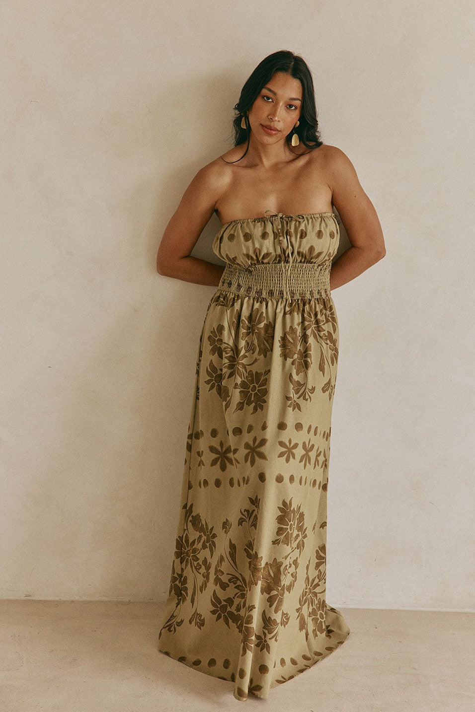 Green maxi dress with a strapless neckline, back view