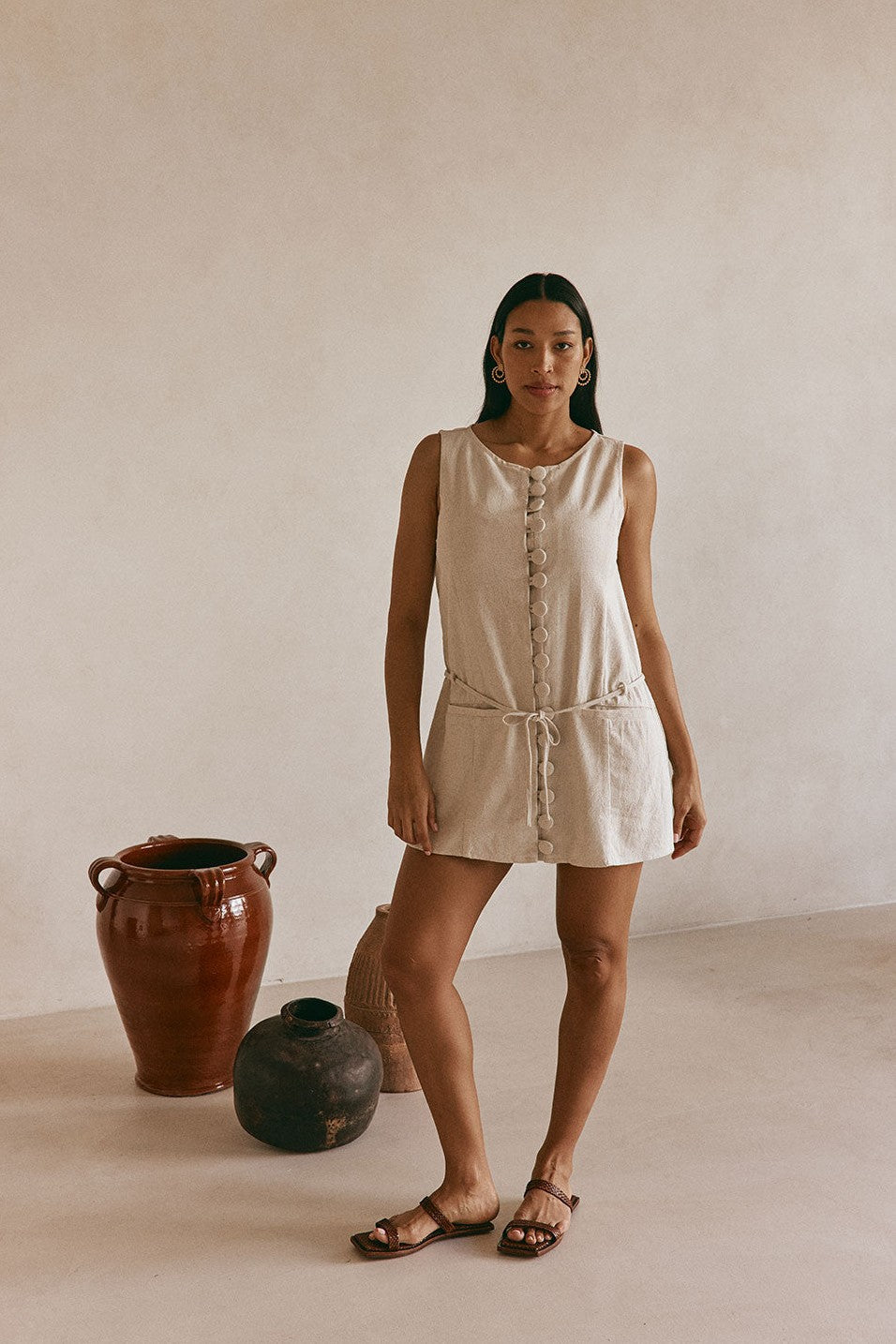 Beige mini dress with an A-line skirt, front view