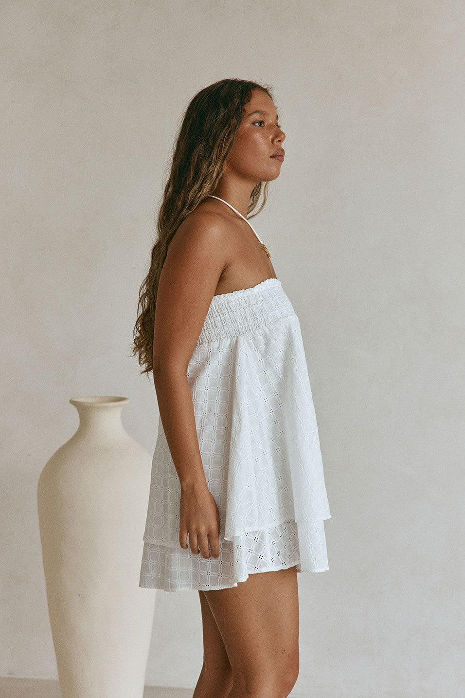 White mini dress with a strapless neckline, front view