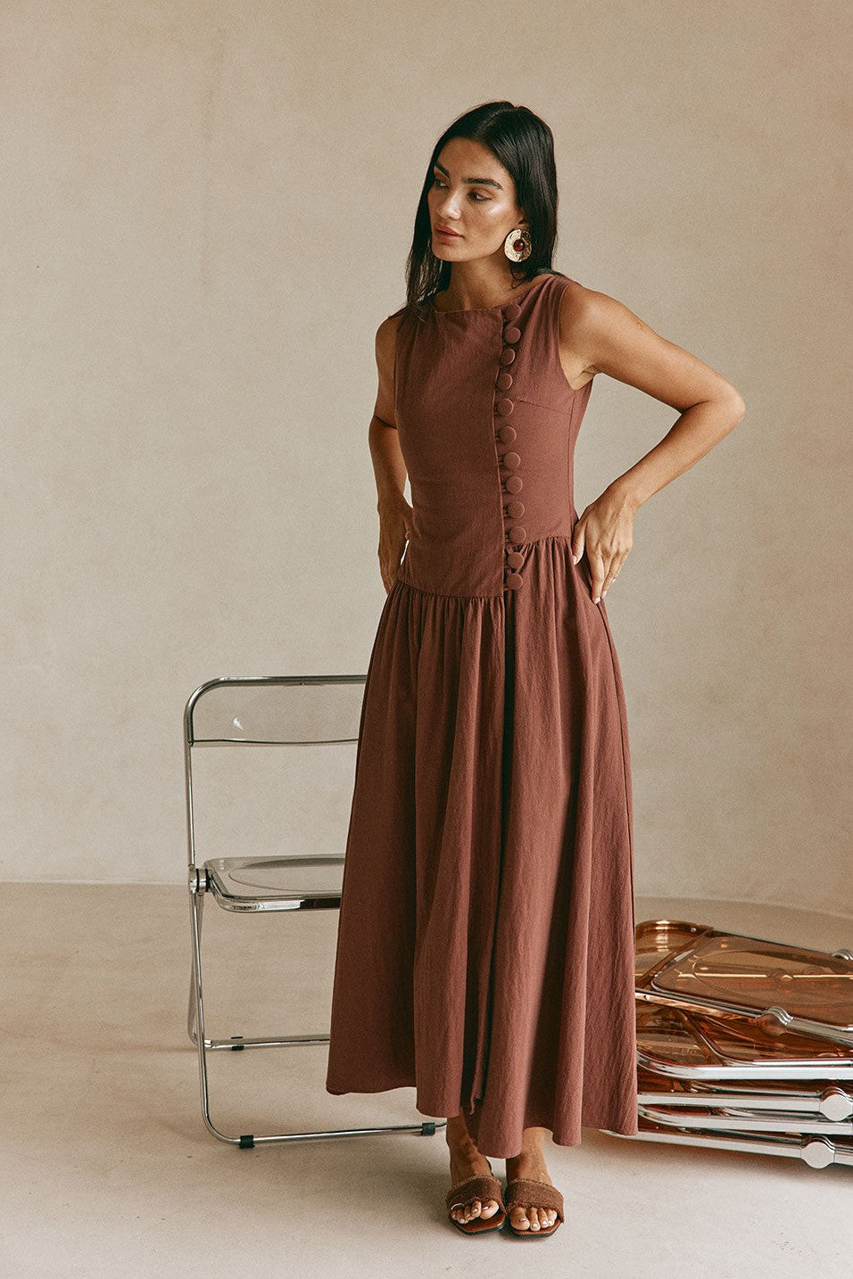 Brown maxi dress with a boat neckline, front view
