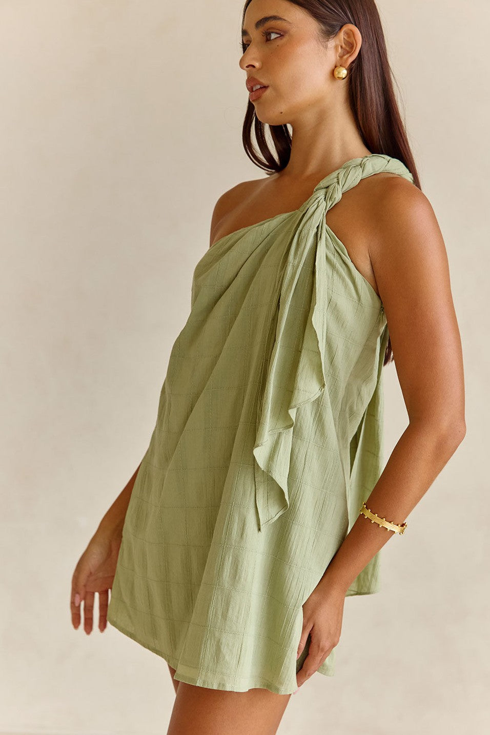 Green mini dress, detail view