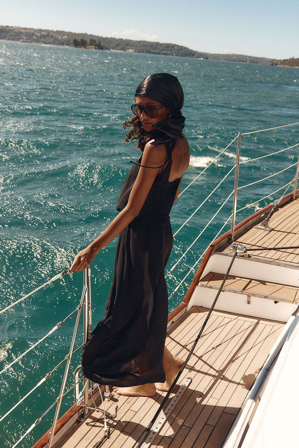 Black maxi dress with a halter neckline, front view