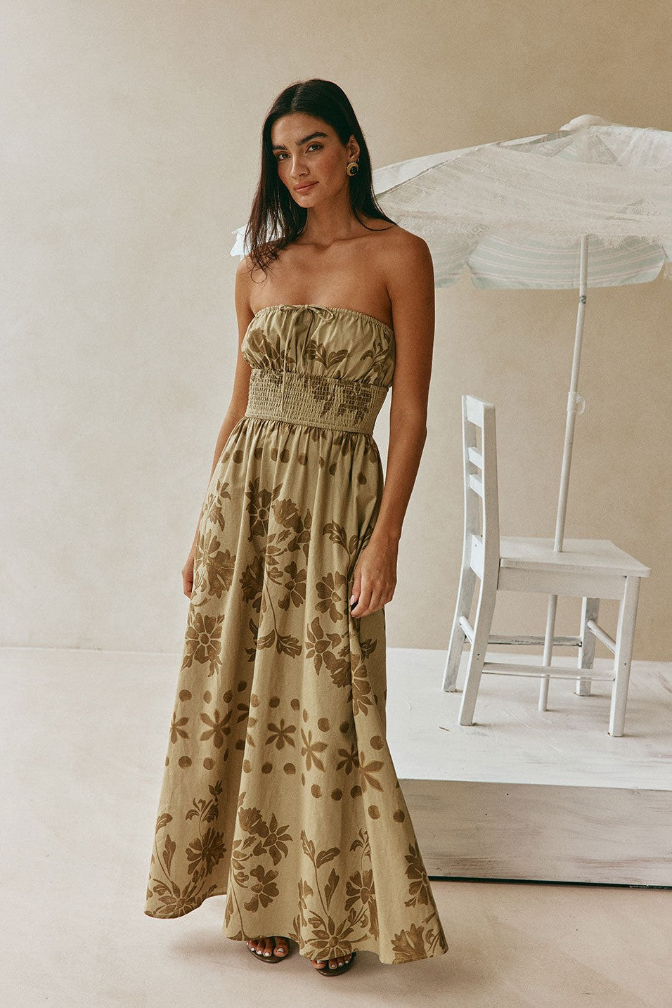 Green maxi dress with a strapless neckline, front view