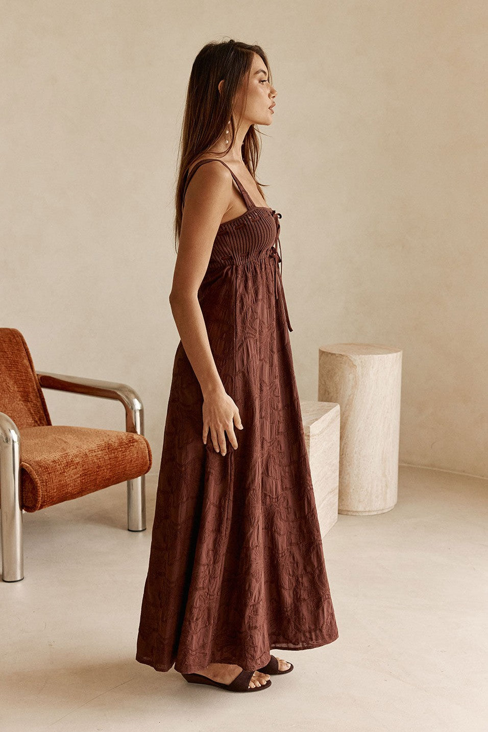 Brown maxi dress with an A-line skirt, detail view