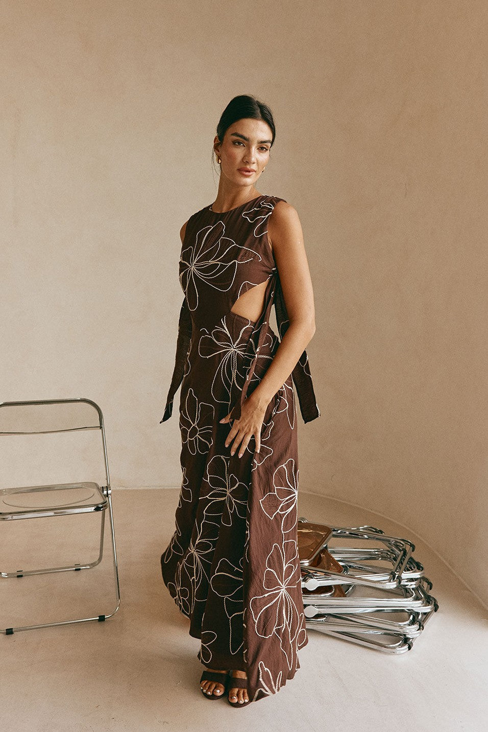 Brown maxi dress with an A-line skirt, detail view