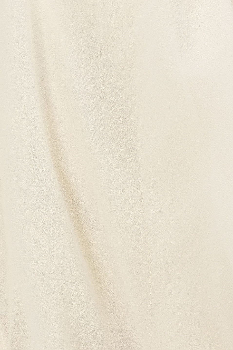 Beige mini dress with a halter neckline, detail view