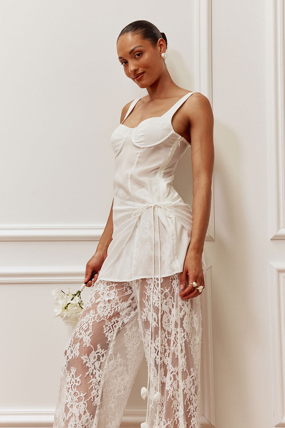 White midi dress with a wrap silhouette, styled on model
