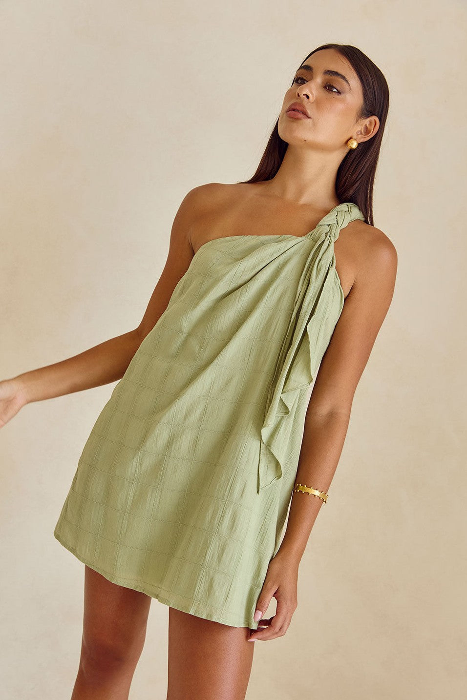 Green mini dress, back view