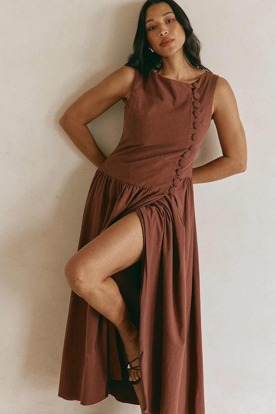 Brown maxi dress with a boat neckline, back view