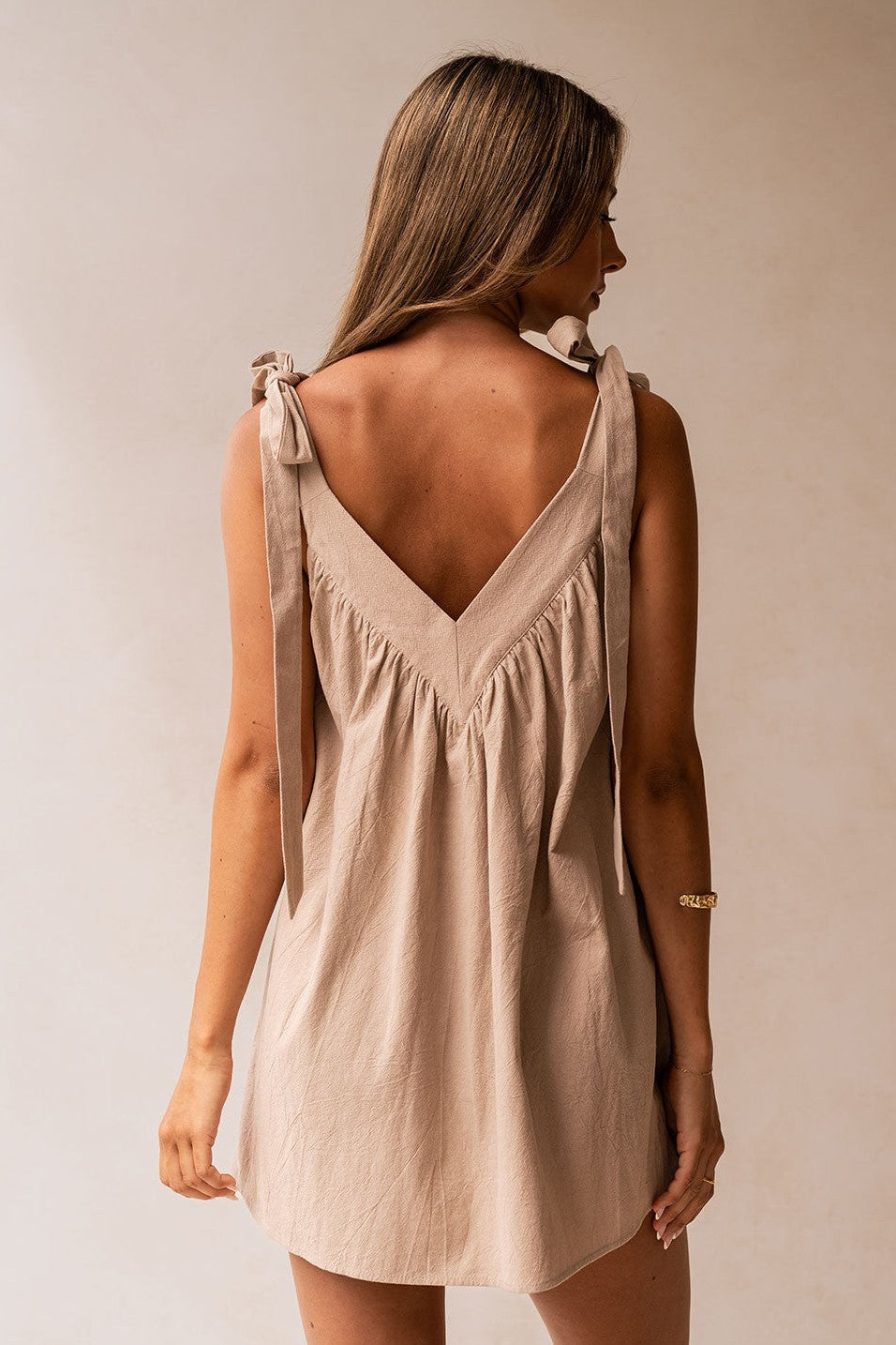 Beige mini dress, detail view