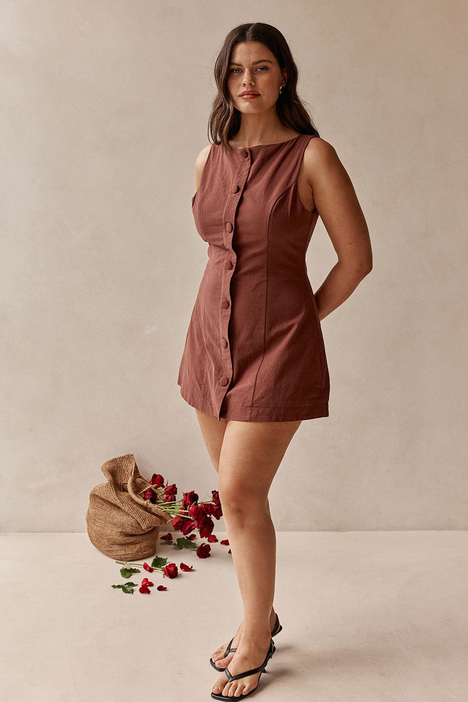 Brown mini dress, styled on model