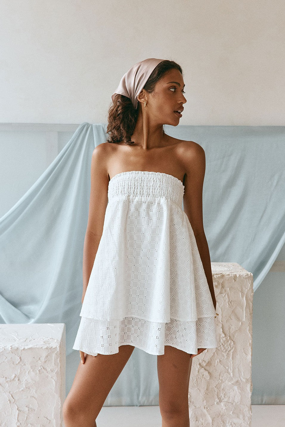 White mini dress with a strapless neckline, front view