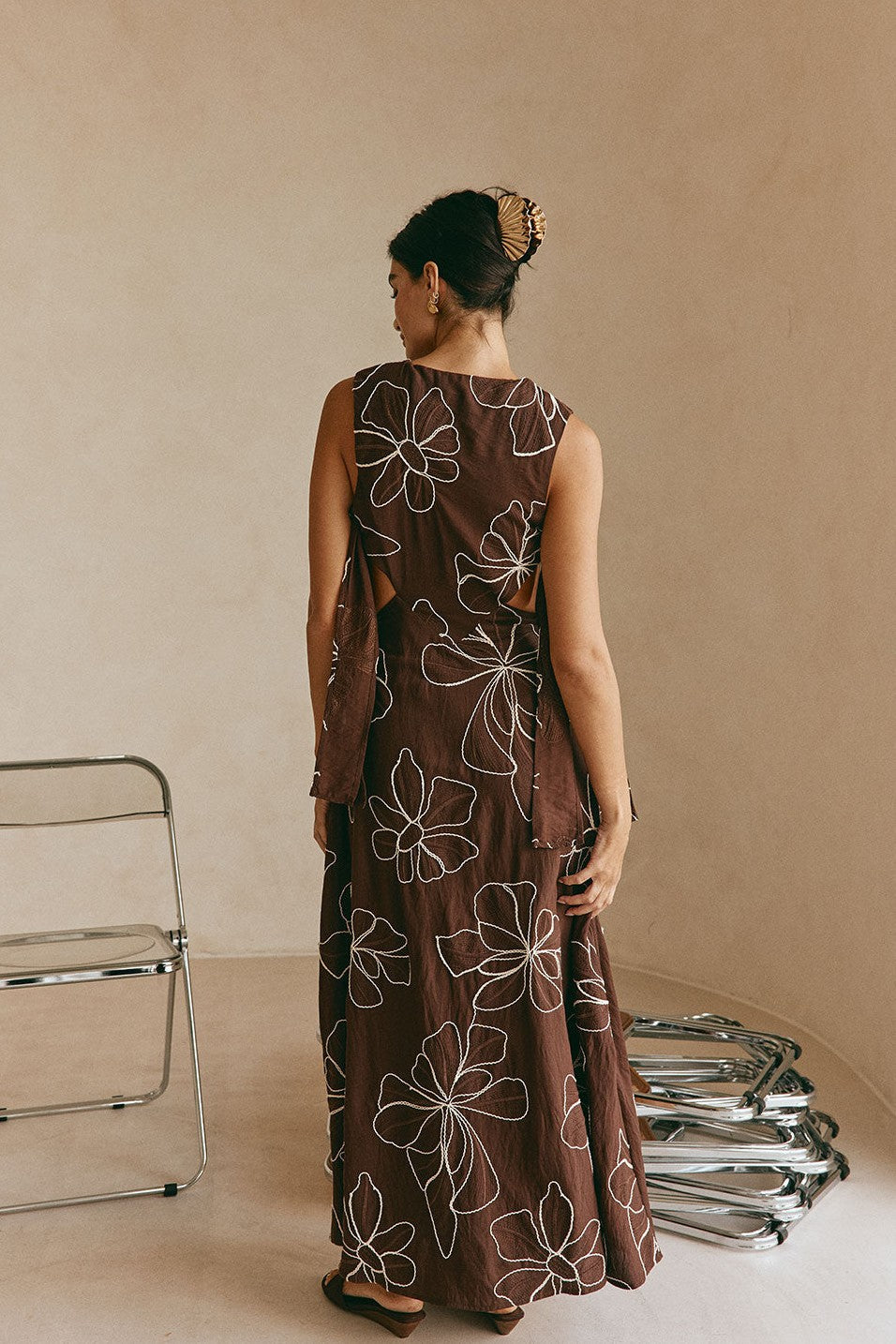Brown maxi dress with an A-line skirt, front view