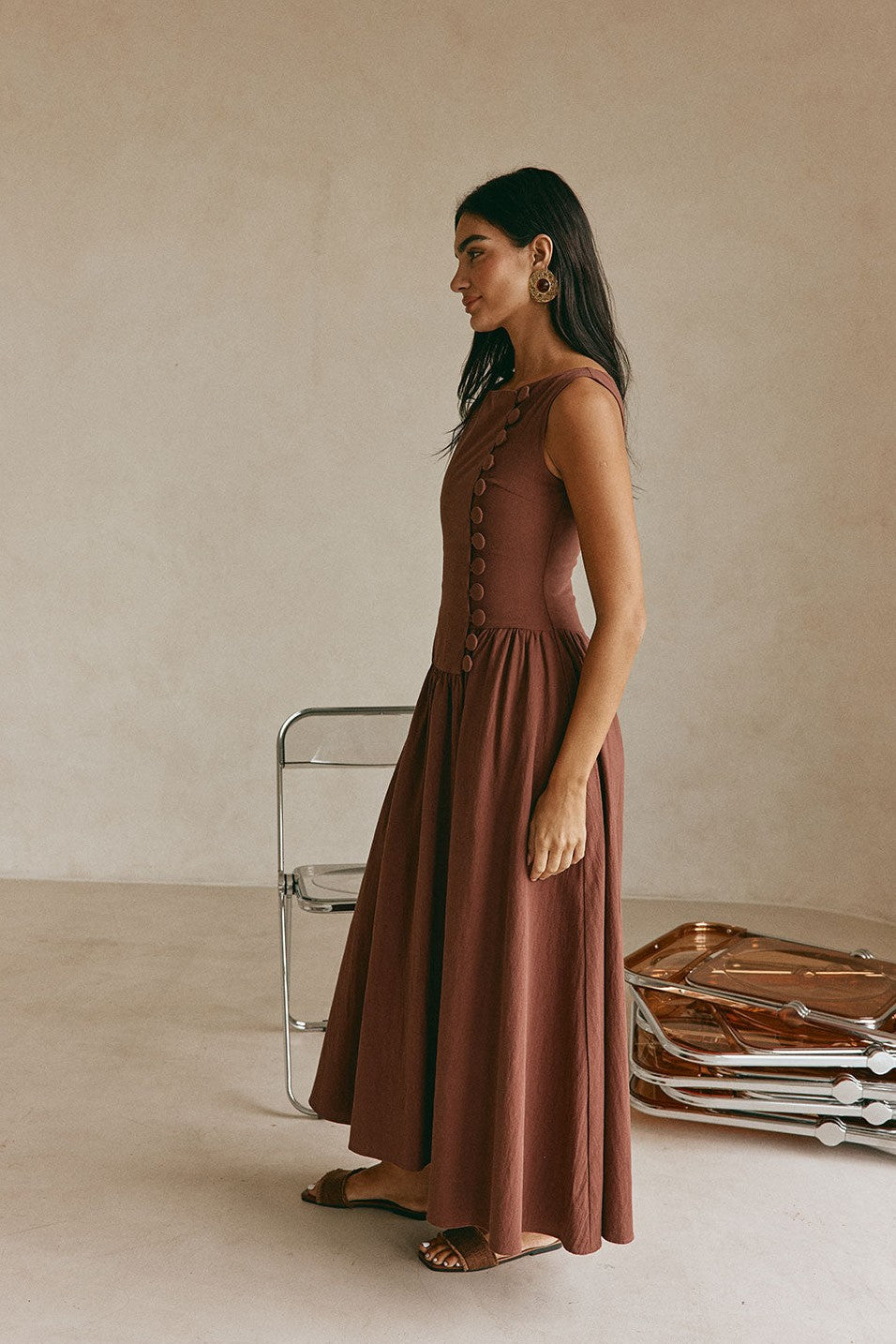 Brown maxi dress with a boat neckline, detail view