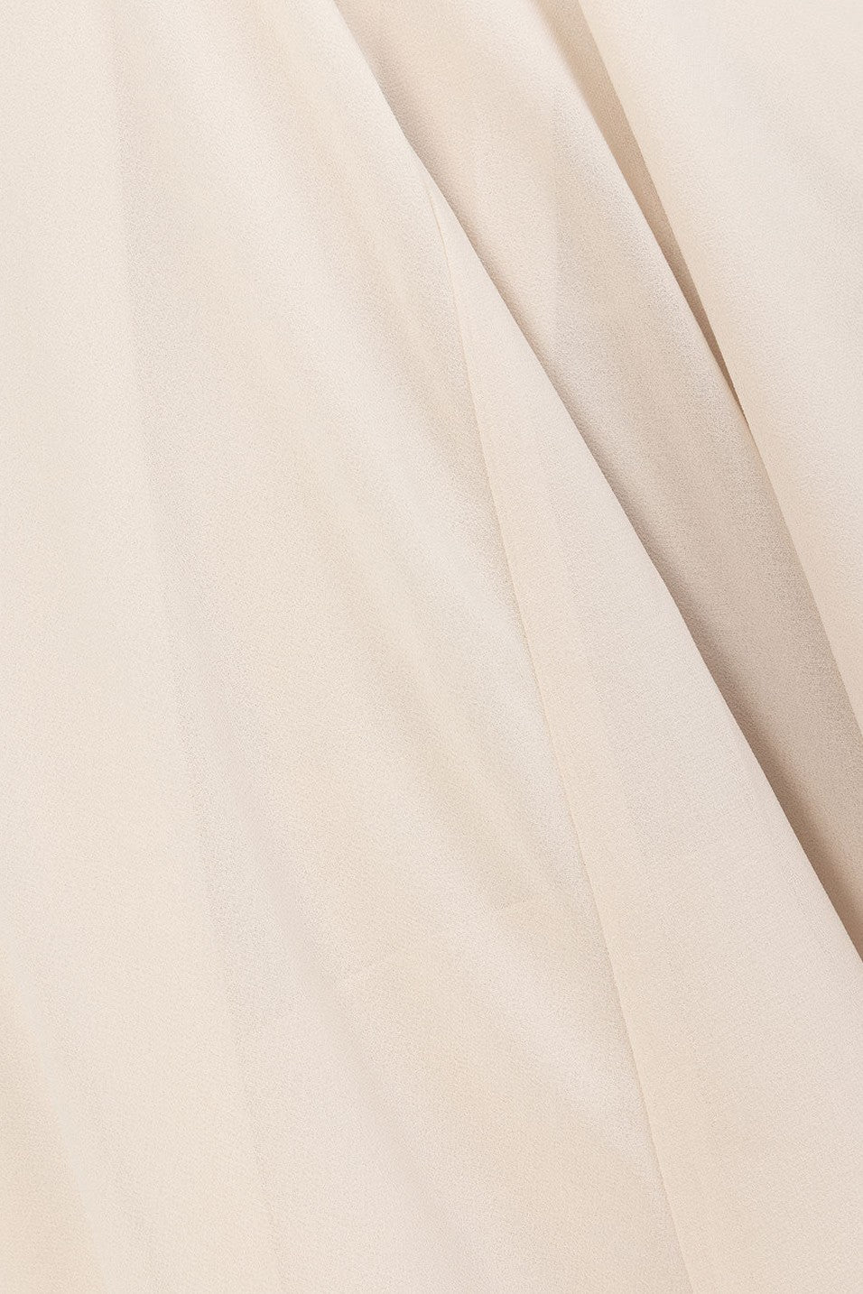 Beige maxi dress with a halter neckline, side view