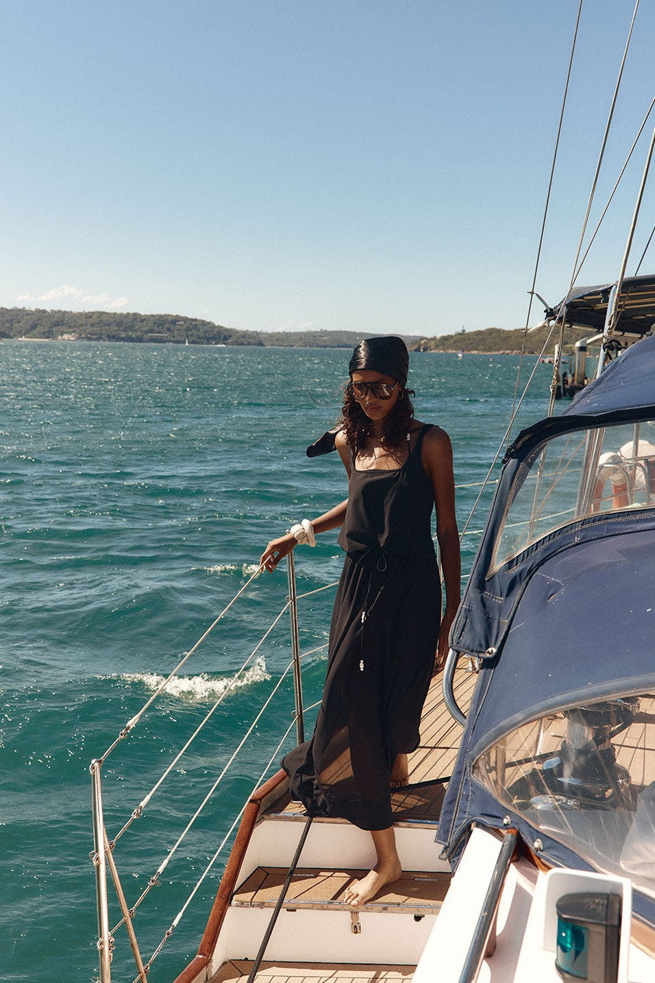 Black maxi dress with a halter neckline, detail view