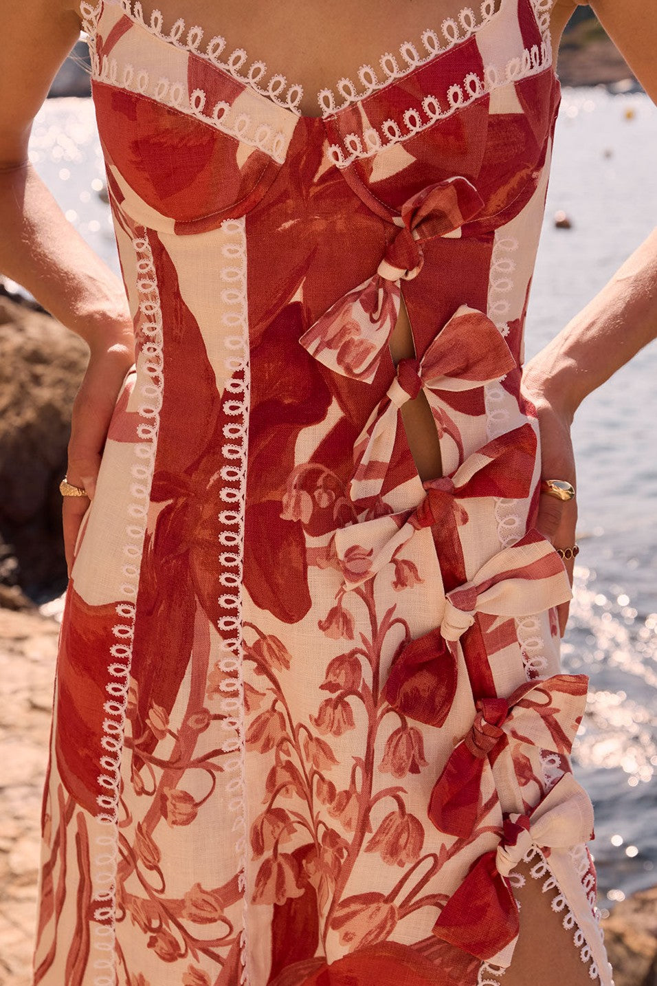 Red maxi dress with a side split, side view