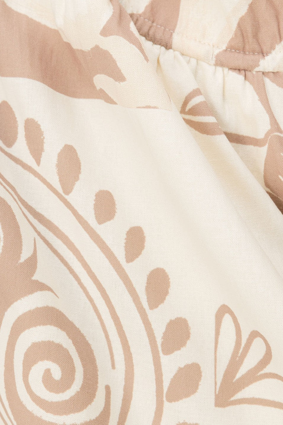 Beige mini dress with shirred detailing, back view