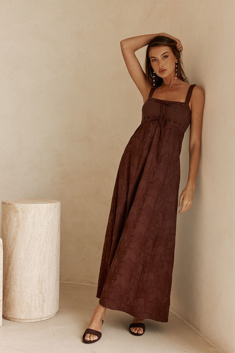 Brown maxi dress with an A-line skirt, front view