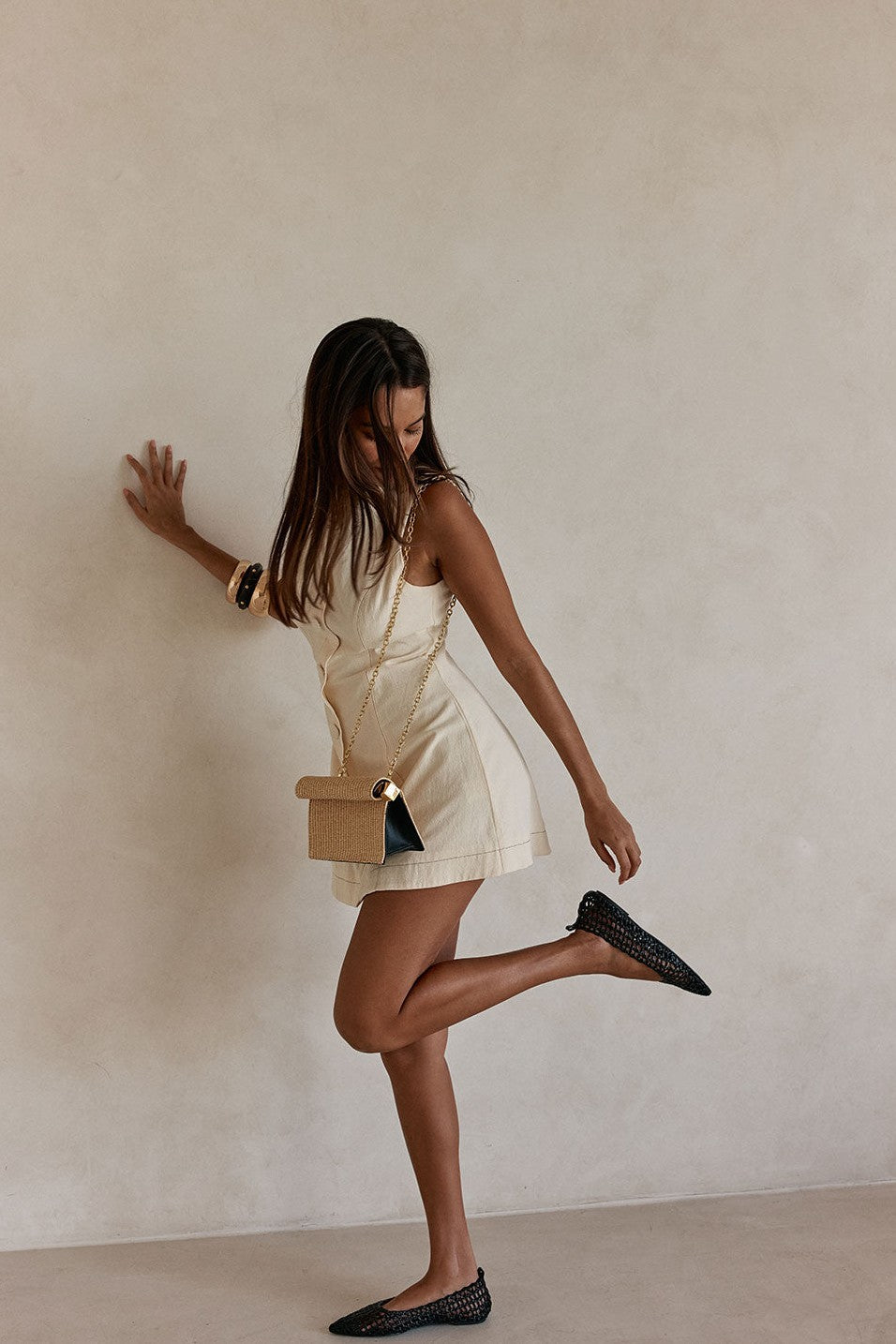 Cream mini dress, styled on model