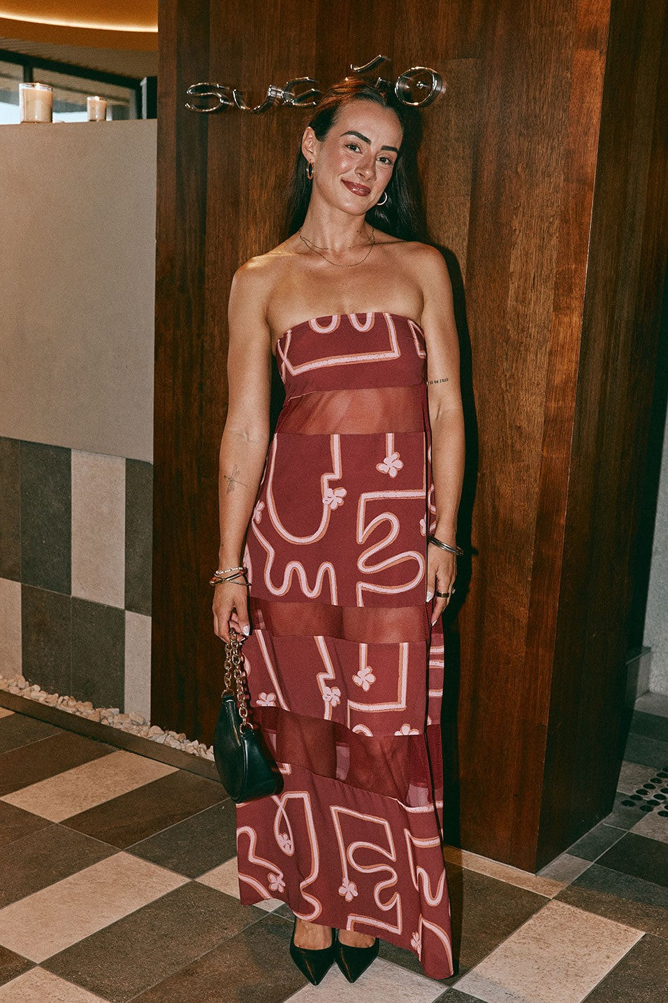 Pink maxi dress with a strapless neckline, back view