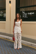 White midi dress with a wrap silhouette, front view