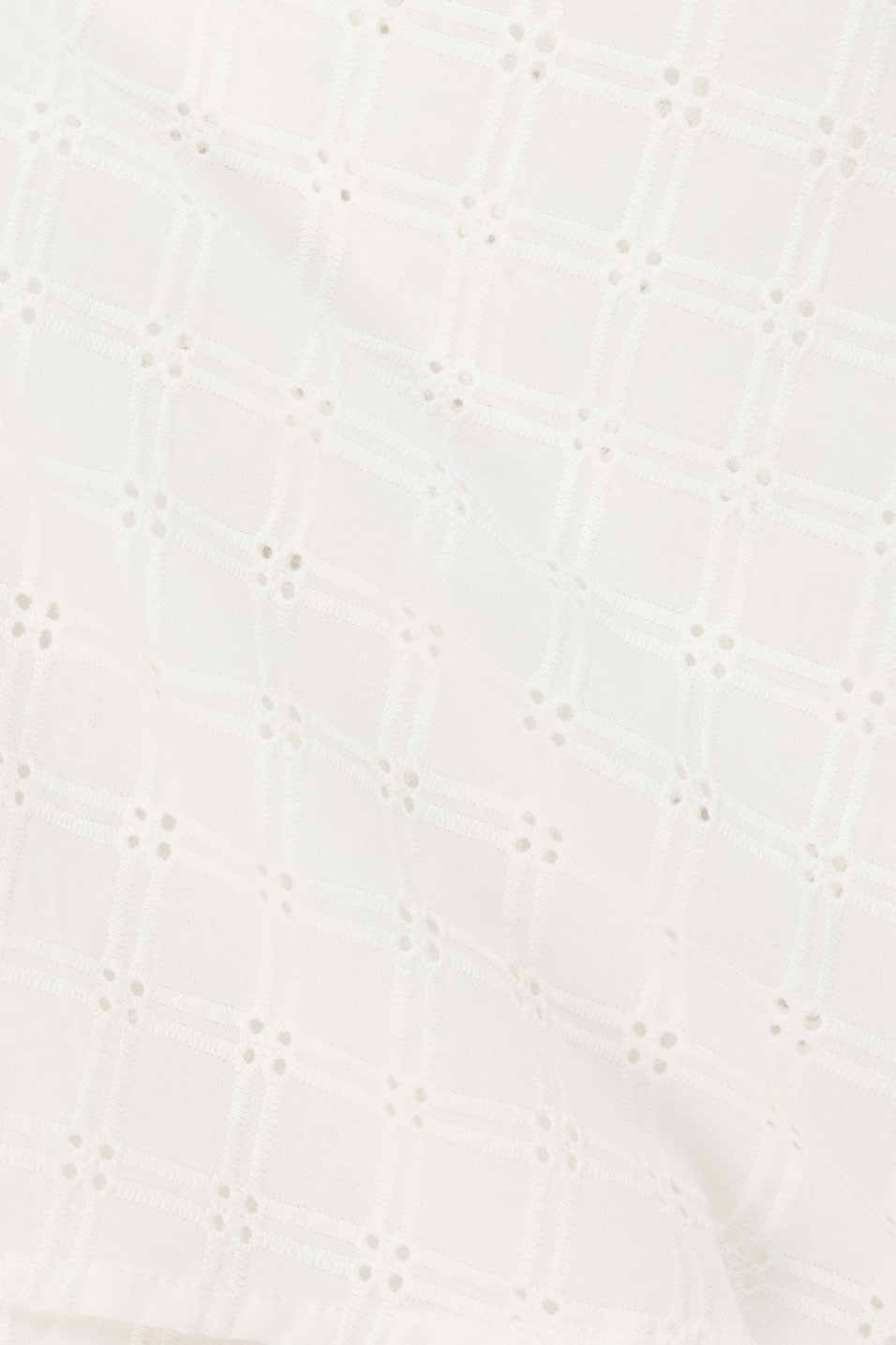 White mini dress with a strapless neckline, detail view