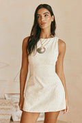 Cream mini dress with an A-line skirt, front view