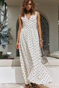 Cream maxi dress with a plunging V neckline, front view