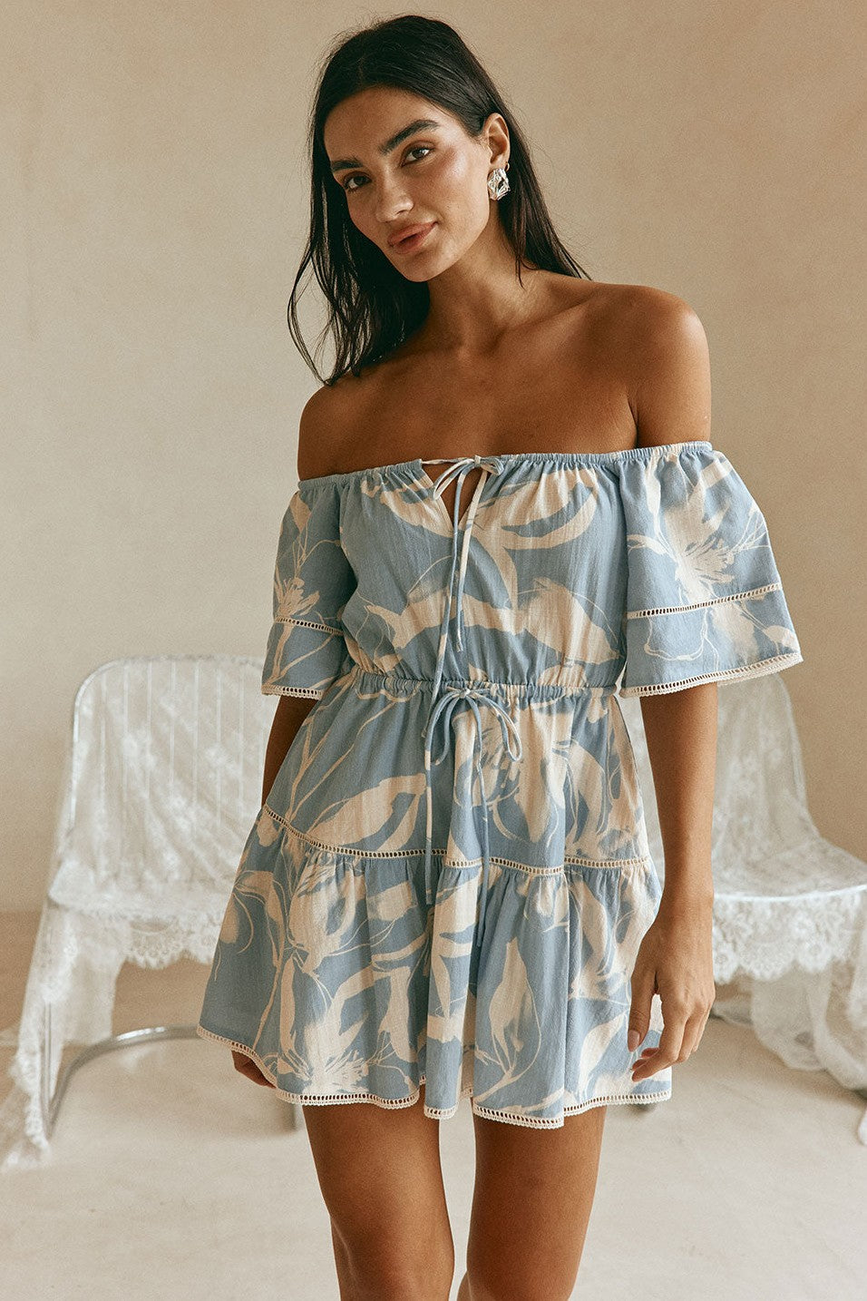 Blue mini dress with a drawstring waist, front view