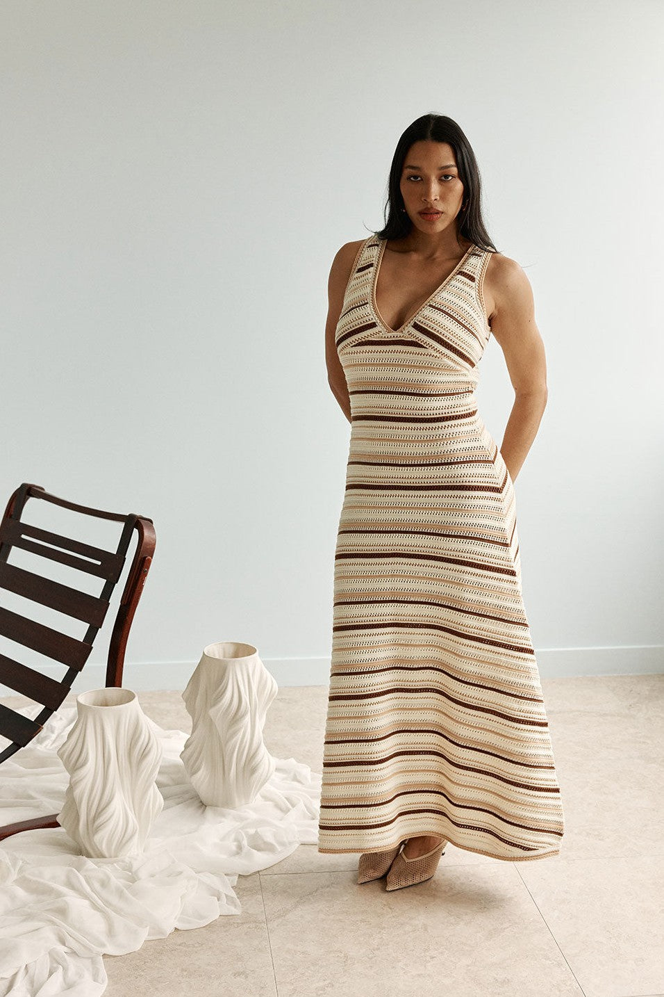 Cream maxi dress with a V neckline, back view